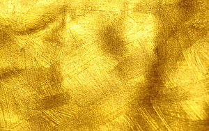 Luxurious Gold Leaf Texture with Brushed Metallic Finish and Warm Yellow Tones HD wallpaper