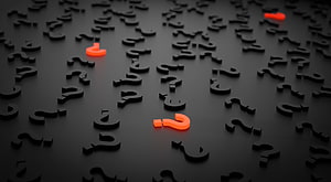 3D Question Mark Symbols on Dark Surface with Orange Accents HD wallpaper