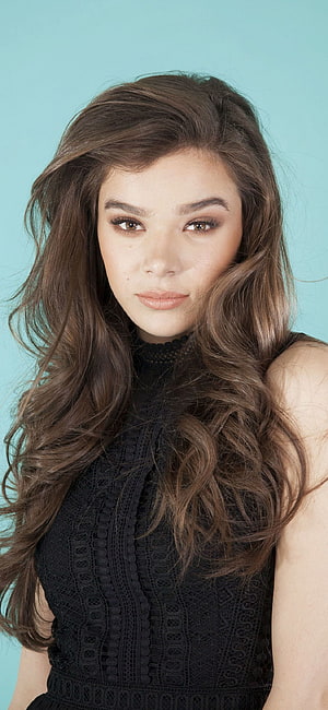 Hailee Steinfeld Portrait in Black Lace Top Against Teal Background HD phone wallpaper