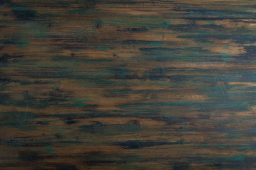 Distressed Dark Wood Surface with Faded Green Paint Streaks and Natural Grain Texture HD wallpaper