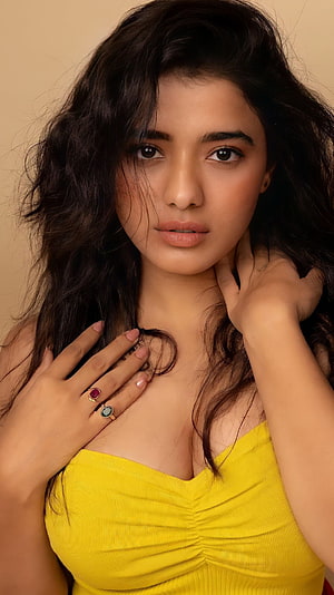 Kethika Sharma Portrait in Yellow Top with Gemstone Rings HD phone wallpaper