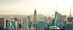 New York City Skyline with Empire State Building at Golden Hour HD wallpaper