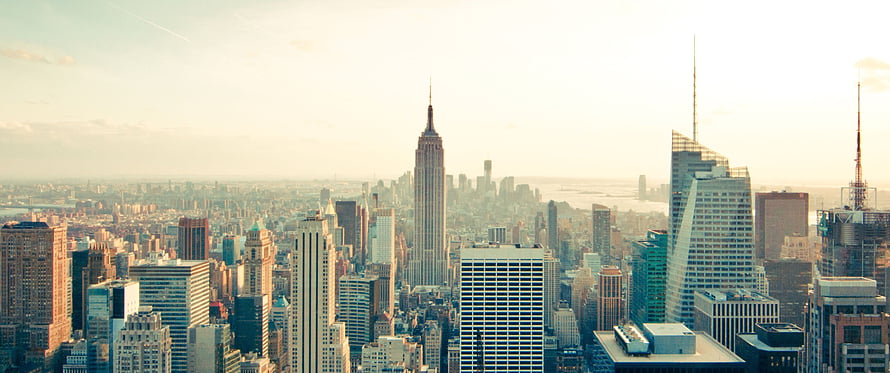 New York City Skyline with Empire State Building at Golden Hour HD wallpaper