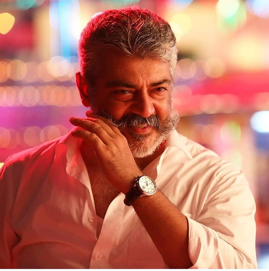 Ajith in Viswasam: Distinguished Portrait with Warm Bokeh Background HD phone wallpaper