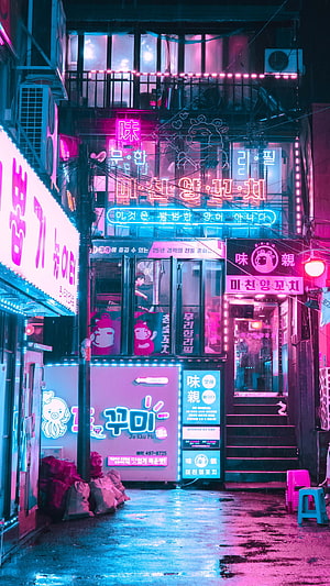 Neon-lit Seoul alleyway with glowing Korean signage and cyberpunk city atmosphere HD phone wallpaper