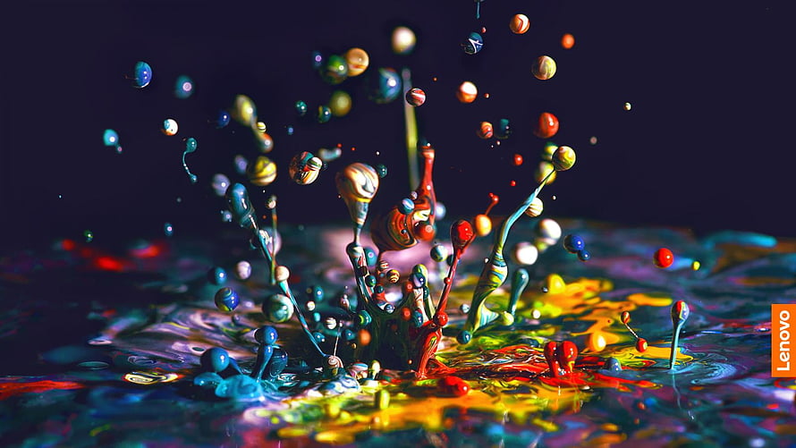 Vibrant Multicolored Paint Splash on Dark Background HD wallpaper