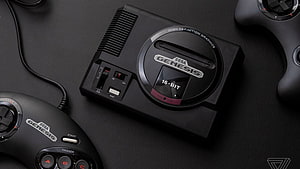 Sega Genesis Mini Retro Console With Classic 3-Button Controller On Dark Surface HD wallpaper