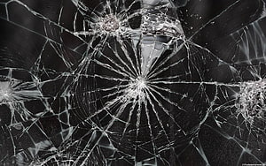Shattered Glass Texture With Multiple Impact Points And Radiating Fracture Lines HD wallpaper
