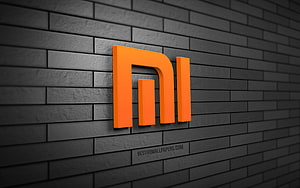 Xiaomi 3D Orange Logo Mounted on Dark Gray Brick Wall HD wallpaper