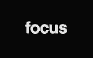 Minimalist Focus Typography on Black Background HD wallpaper