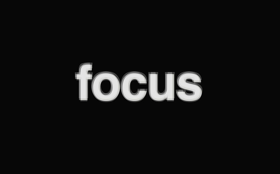 Minimalist Focus Typography on Black Background HD wallpaper