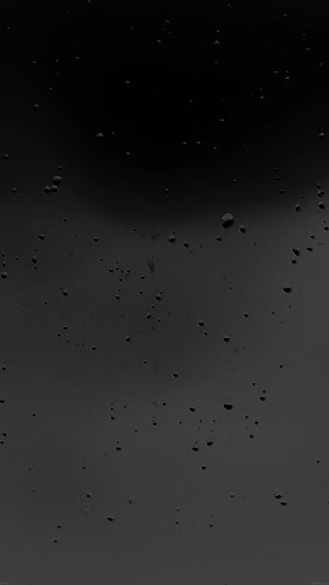 Dark Matte Surface with Scattered Water Droplets and Minimalist Texture HD phone wallpaper