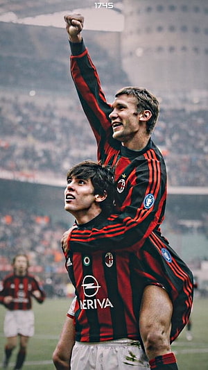 Kaka and Shevchenko Celebrate in AC Milan Striped Kits at the Stadium HD phone wallpaper