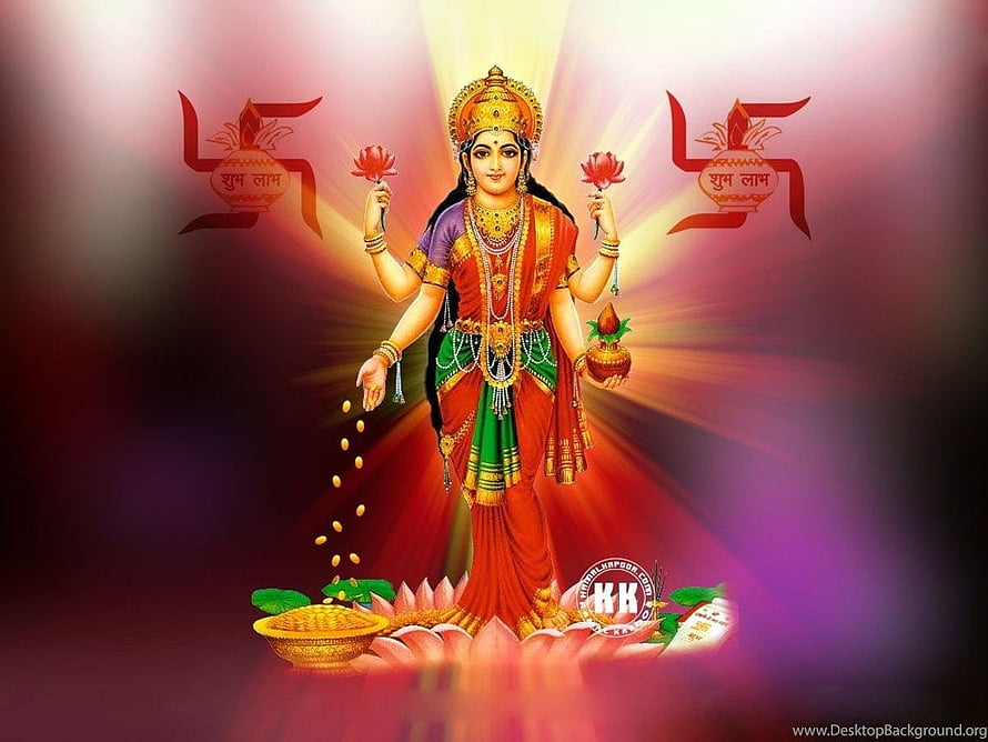 Goddess Lakshmi Standing on Lotus with Diya and Coins Radiating Divine Light HD wallpaper