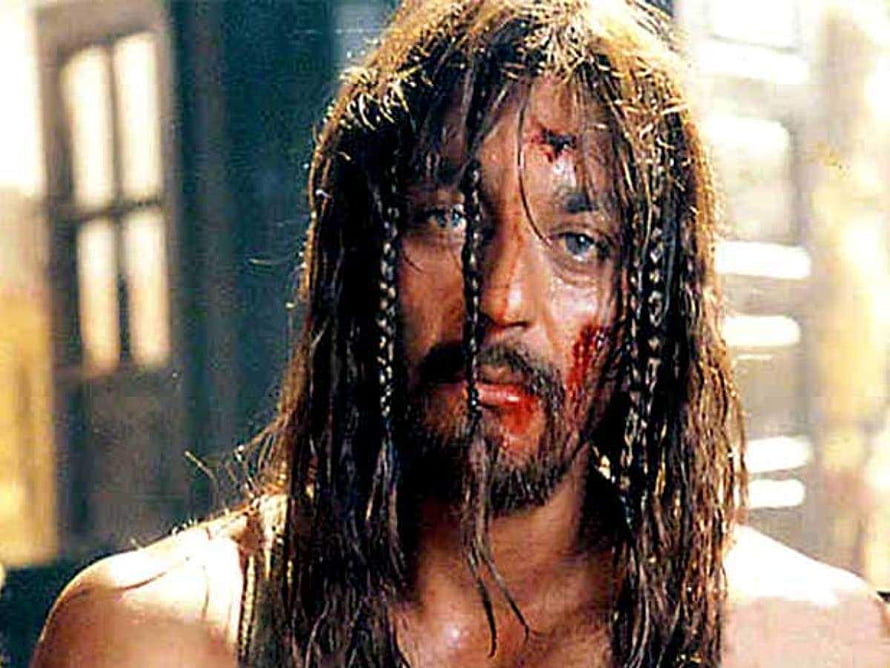 Sanjay Dutt as Ballu in Khalnayak with long braided hair and bloodied face in dramatic close-up HD wallpaper