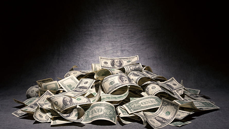 Pile of US Dollar Bills on Dark Gray Background HD wallpaper