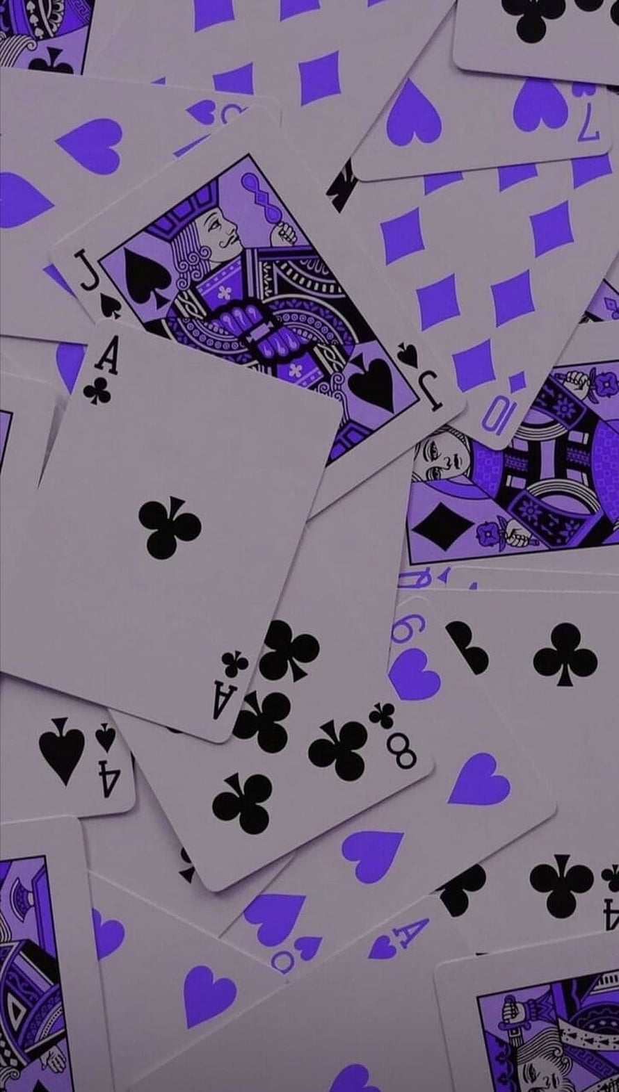 Scattered Purple Playing Cards with Black Suits and Face Card Illustrations HD phone wallpaper