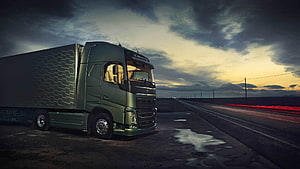 Volvo FH16 Semi Truck on Highway at Dusk in Euro Truck Simulator 2 HD wallpaper