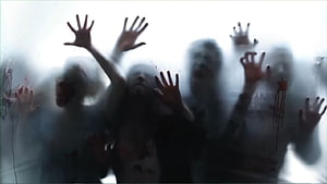 Horror Scene of Zombies Pressing Against a Foggy Glass Window with Bloodstains HD wallpaper