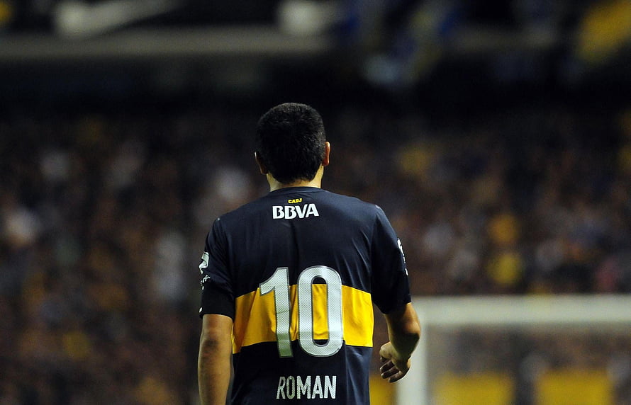 Juan Roman Riquelme in Boca Juniors Kit Walking on the Pitch HD wallpaper