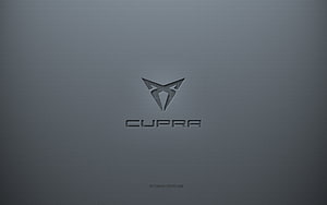 Cupra automotive emblem on a minimalist dark gray textured surface with subtle 3D depth and metallic finish HD wallpaper