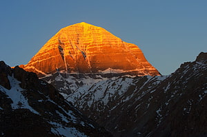 Mount Kailash Peak Glowing Golden at Sunset in the Himalayas HD wallpaper