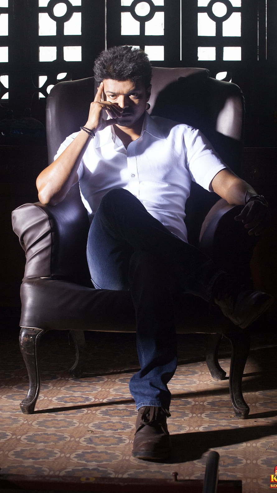 Vijay Thalapathy in Dramatic White Shirt Portrait Seated in Leather Armchair HD phone wallpaper
