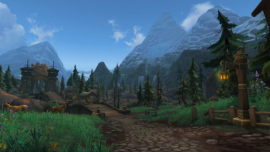 World of Warcraft Mountain Village Landscape with Snow-Capped Peaks and Cobblestone Path HD wallpaper