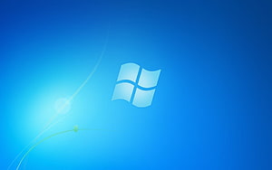 Windows 7 Starter Edition Default Blue Desktop Background with Logo and Light Flare HD wallpaper