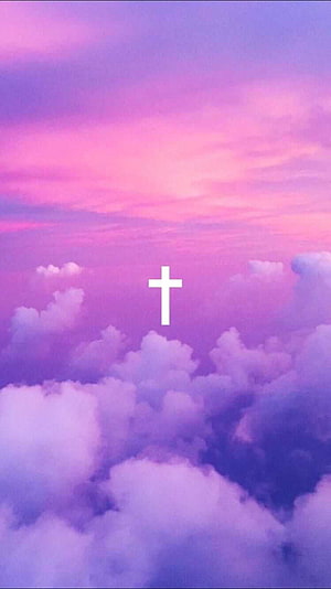 White Christian Cross Floating Above Purple Clouds in a Dreamy Sunset Sky HD phone wallpaper