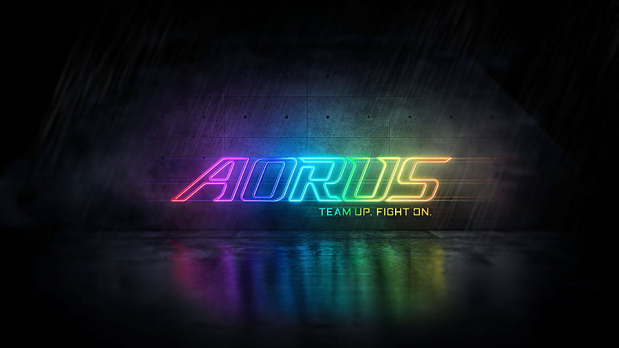 AORUS Neon Rainbow Logo on Dark Concrete Wall with Wet Floor Reflection HD wallpaper