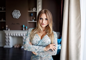 Blonde Woman in Blue Embroidered Dress Standing in Elegant Interior HD wallpaper