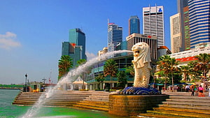 Merlion Fountain Spouting Water Against Singapore City Skyline HD wallpaper