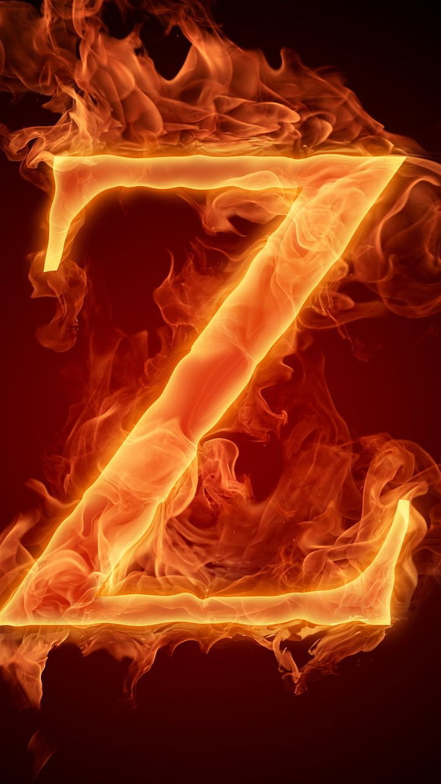 Blazing Letter Z Rendered in Intense Orange Flames Against a Dark Background HD phone wallpaper