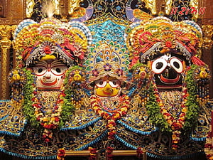Jagannath Subhadra Balbhadra Deities in Ornate Temple Setting HD wallpaper