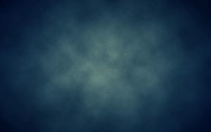 Dark Blue Abstract Texture with Soft Mottled Surface and Subtle Stains HD wallpaper