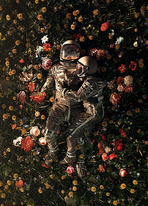 Two Astronauts Embracing in a Lush Field of Wildflowers and Roses HD phone wallpaper