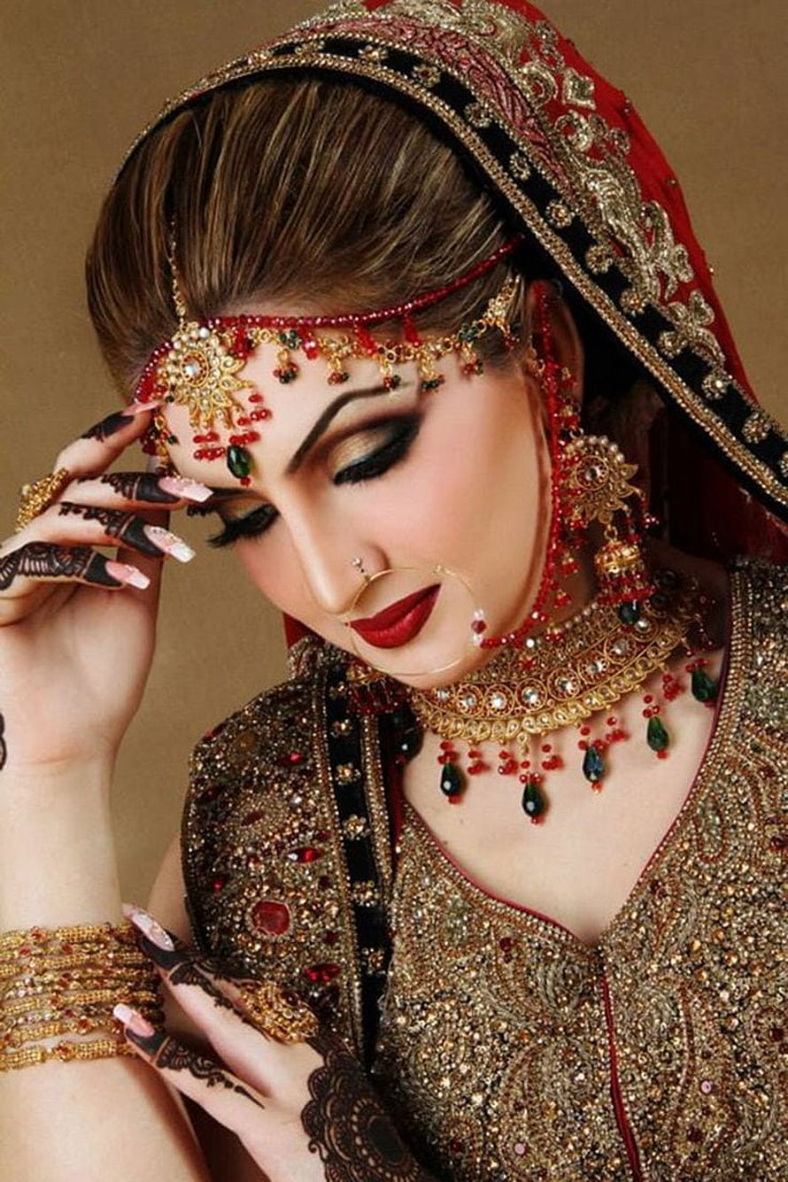 Elegant Indian Bride in Traditional Red and Gold Bridal Attire with Intricate Jewelry and Henna HD phone wallpaper