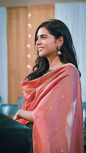 Kalyani Priyadarshini in a soft coral dupatta with traditional jhumka earrings HD phone wallpaper