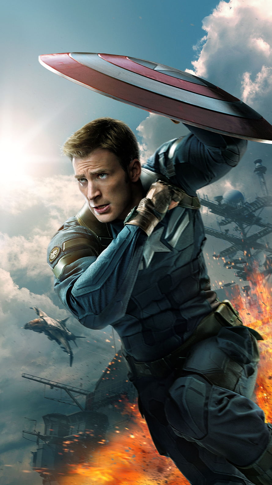 Captain America in Combat with Shield and Warship Explosion HD phone wallpaper