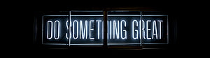 Glowing Neon Sign Reading Do Something Great Against a Dark Background HD wallpaper