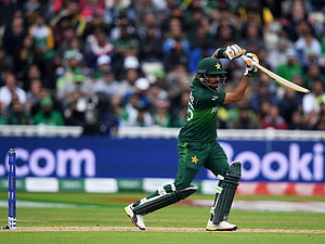 Babar Azam in action for Pakistan during a World Cup cricket match HD wallpaper