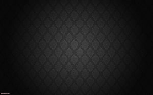 Elegant Black Damask Pattern with Subtle Ornamental Motifs and Vignette HD wallpaper
