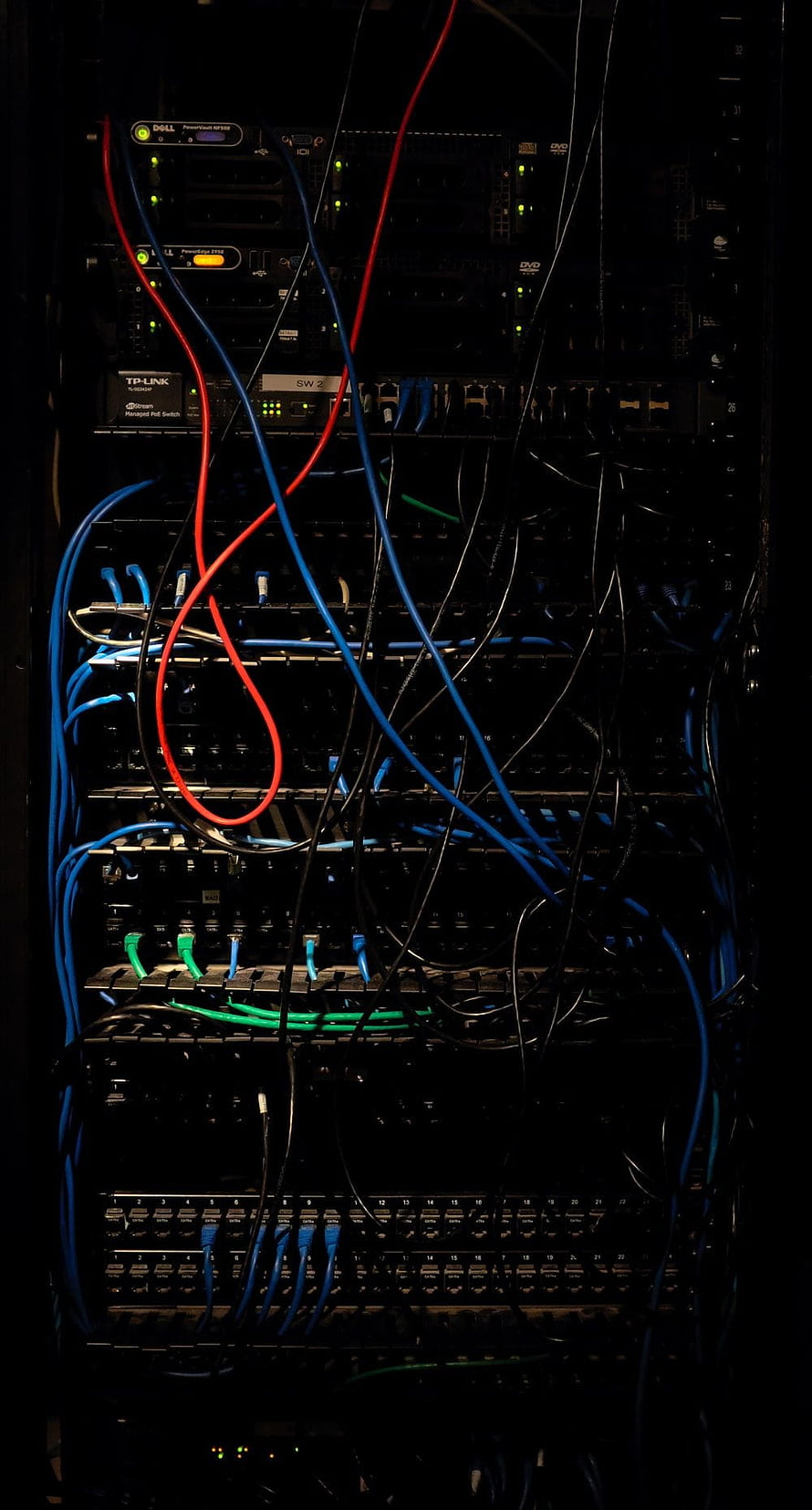 Dark Server Rack with Colorful Network Cables and Switches HD phone wallpaper