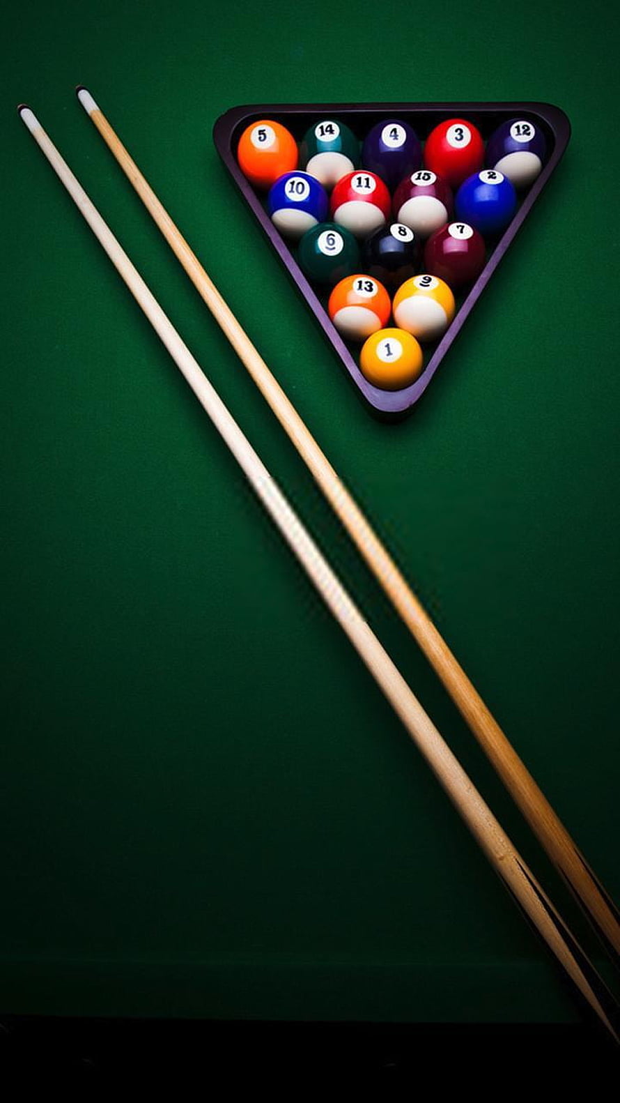 Pool balls racked in triangle with two cues on green felt table HD phone wallpaper