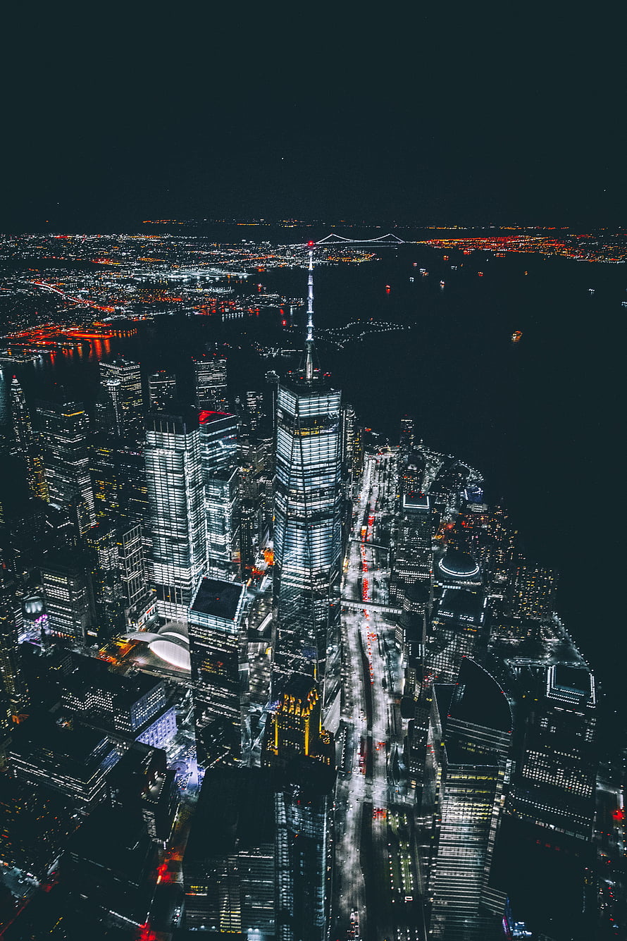 Aerial Night View of One World Trade Center and Lower Manhattan Skyline in New York City HD phone wallpaper