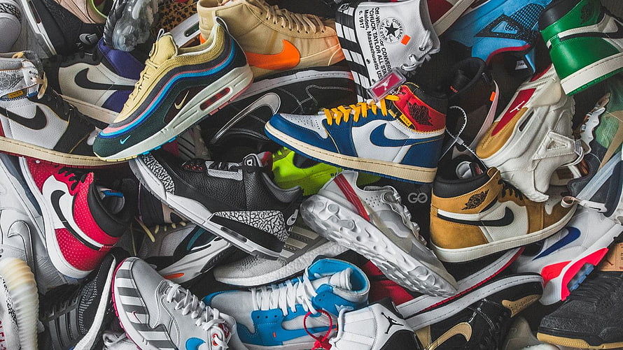 Colorful Collection of Nike and Adidas Sneakers Piled Together HD wallpaper