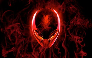 Glowing Red Alien Mask with Swirling Smoke on Black Background HD wallpaper