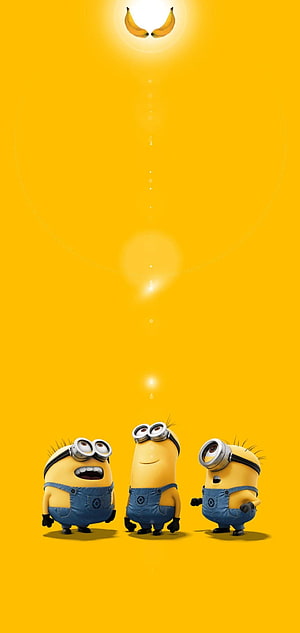Three Minions Looking Up at Glowing Bananas on a Vibrant Yellow Background HD phone wallpaper