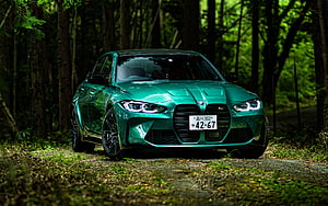 Emerald Green BMW M3 Competition G80 Sedan Parked on a Forest Road HD wallpaper